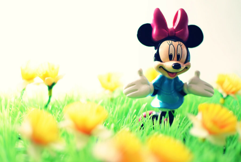 Minnie Mouse stands in a field of yellow buttercups. =gtg=