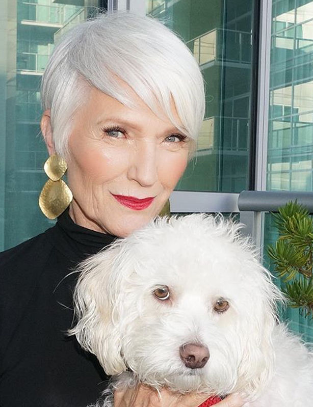 Author Maye Musk with her dog