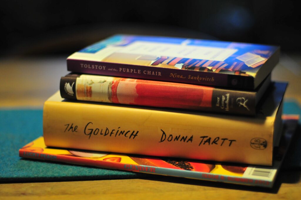 A stack of four books to read during a pandemic