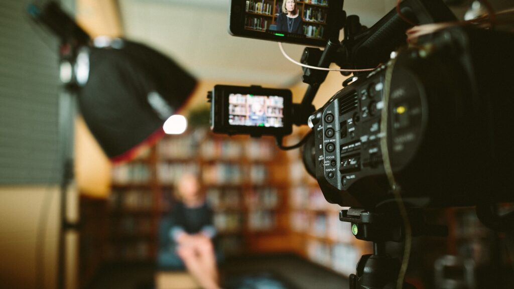 video camera filming blurry woman