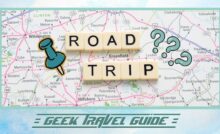 Scrabble tiles sit on a random map of the US with question marks and a pin marking a destination.